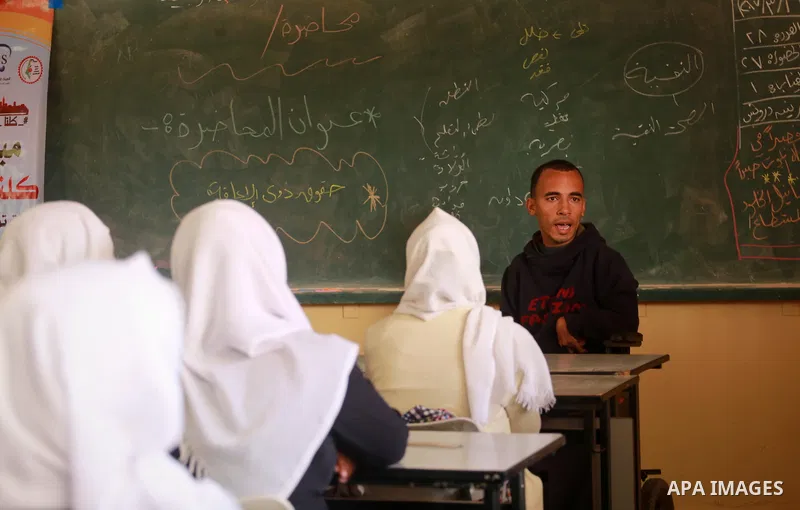 Disabled Palestinian, Mohammed abu Kmail, visits the schools, in Gaza city, on March 16, 2017, during an Initiative of the Disabled Union to introduce the disabled and how society deals with people with special needs. Ph...