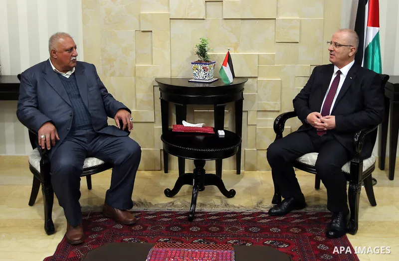 Palestinian Prime Minister Rami Hamdallah, meets with Prisoner Ibrahim masalma, in West Bank, city of ramallah on March19.2017. Photo by Prime Minister Office