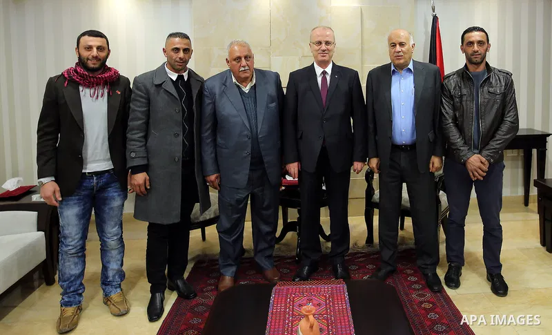 Palestinian Prime Minister Rami Hamdallah, meets with Prisoner Ibrahim masalma, in West Bank, city of ramallah on March19.2017. Photo by Prime Minister Office