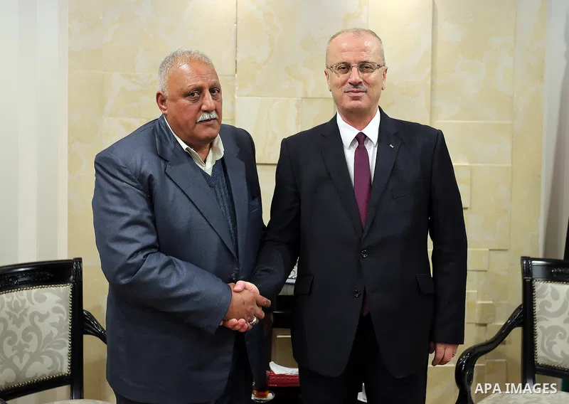 Palestinian Prime Minister Rami Hamdallah, meets with Prisoner Ibrahim masalma, in West Bank, city of ramallah on March19.2017. Photo by Prime Minister Office