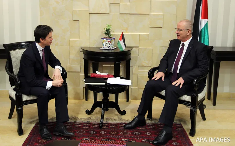 Palestinian Prime Minister Rami Hamdallah, meets with British Minister of State for International Development Rory Stewart, in West Bank, city of ramallah on March19.2017. Photo by Prime Minister Office
