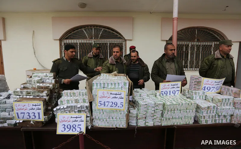 Palestinian anti-drug police participate in a conference drug damage in Gaza City on March 19, 2017. Destroying the collected drugs was part of a new campaign by Hamas-run police to combat the usage of drugs and Tramadol...
