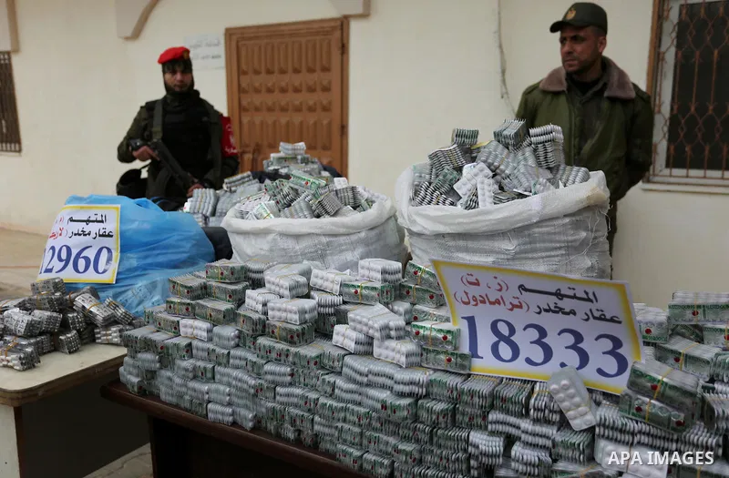 Palestinian anti-drug police participate in a conference drug damage in Gaza City on March 19, 2017. Destroying the collected drugs was part of a new campaign by Hamas-run police to combat the usage of drugs and Tramadol...
