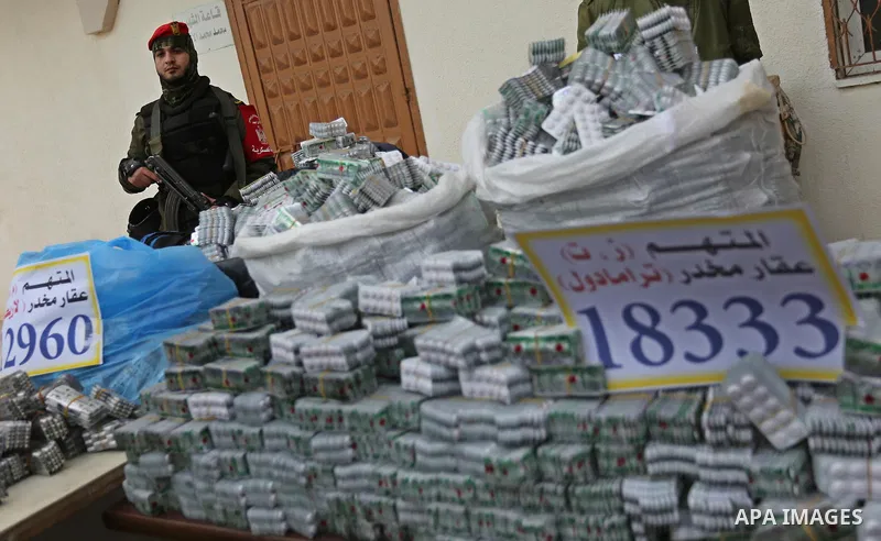 Palestinian anti-drug police participate in a conference drug damage in Gaza City on March 19, 2017. Destroying the collected drugs was part of a new campaign by Hamas-run police to combat the usage of drugs and Tramadol...
