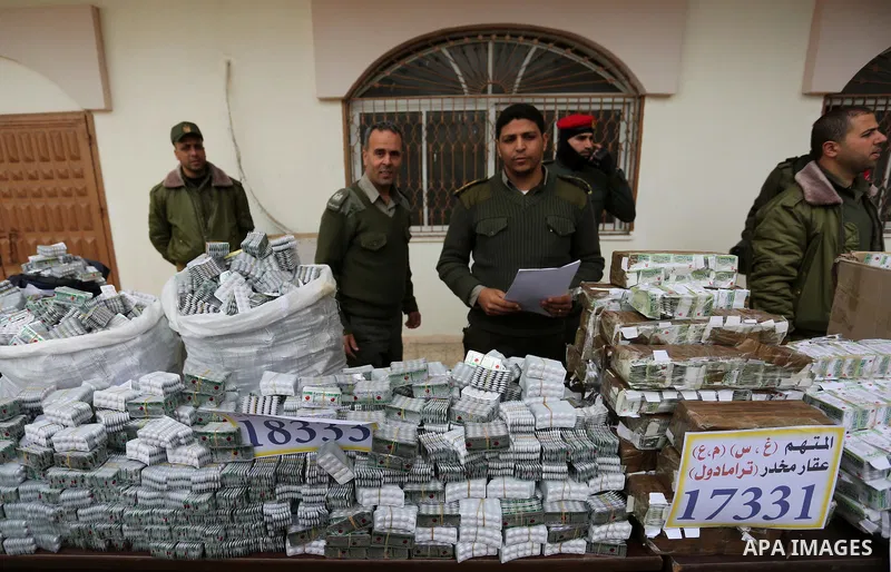 Palestinian anti-drug police participate in a conference drug damage in Gaza City on March 19, 2017. Destroying the collected drugs was part of a new campaign by Hamas-run police to combat the usage of drugs and Tramadol...