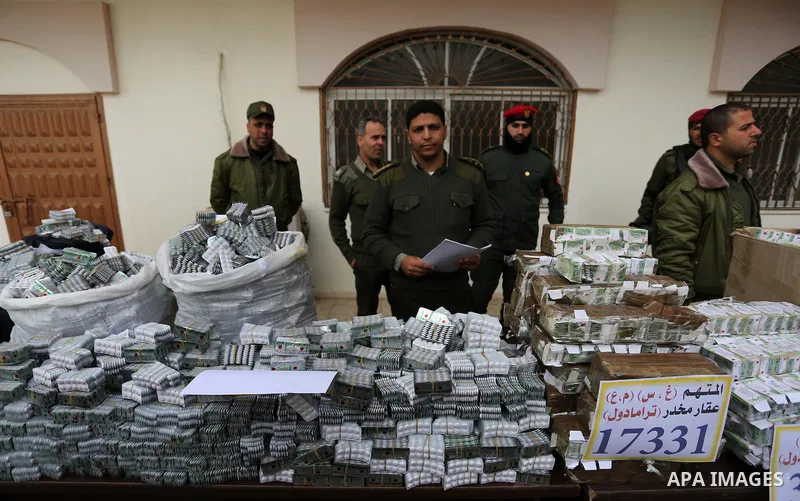 Palestinian anti-drug police participate in a conference drug damage in Gaza City on March 19, 2017. Destroying the collected drugs was part of a new campaign by Hamas-run police to combat the usage of drugs and Tramadol...