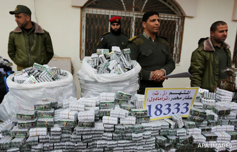 Palestinian anti-drug police participate in a conference drug damage in Gaza City on March 19, 2017. Destroying the collected drugs was part of a new campaign by Hamas-run police to combat the usage of drugs and Tramadol...