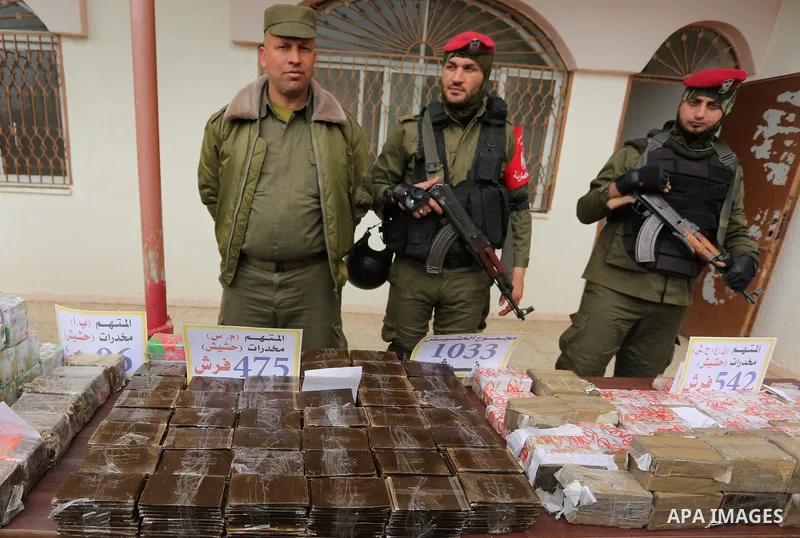 Palestinian anti-drug police participate in a conference drug damage in Gaza City on March 19, 2017. Destroying the collected drugs was part of a new campaign by Hamas-run police to combat the usage of drugs and Tramadol...