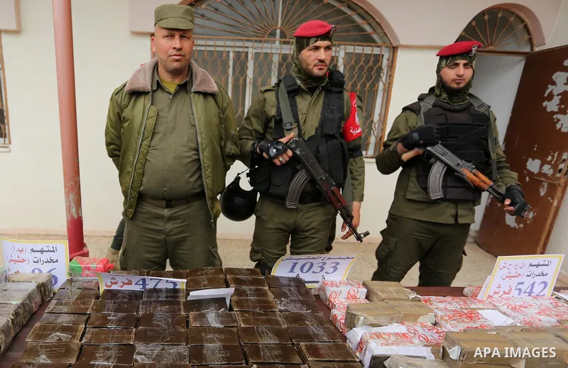Palestinian anti-drug police participate in a conference drug damage in Gaza City on March 19, 2017. Destroying the collected drugs was part of a new campaign by Hamas-run police to combat the usage of drugs and Tramadol...