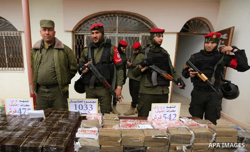 Palestinian anti-drug police participate in a conference drug damage in Gaza City on March 19, 2017. Destroying the collected drugs was part of a new campaign by Hamas-run police to combat the usage of drugs and Tramadol...