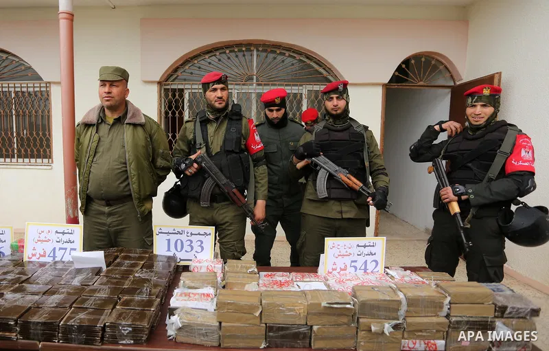 Palestinian anti-drug police participate in a conference drug damage in Gaza City on March 19, 2017. Destroying the collected drugs was part of a new campaign by Hamas-run police to combat the usage of drugs and Tramadol...