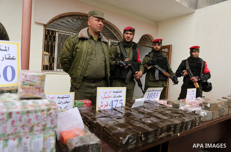 Palestinian anti-drug police participate in a conference drug damage in Gaza City on March 19, 2017. Destroying the collected drugs was part of a new campaign by Hamas-run police to combat the usage of drugs and Tramadol...