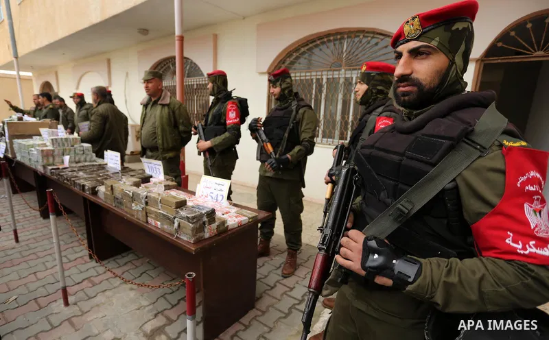 Palestinian anti-drug police participate in a conference drug damage in Gaza City on March 19, 2017. Destroying the collected drugs was part of a new campaign by Hamas-run police to combat the usage of drugs and Tramadol...