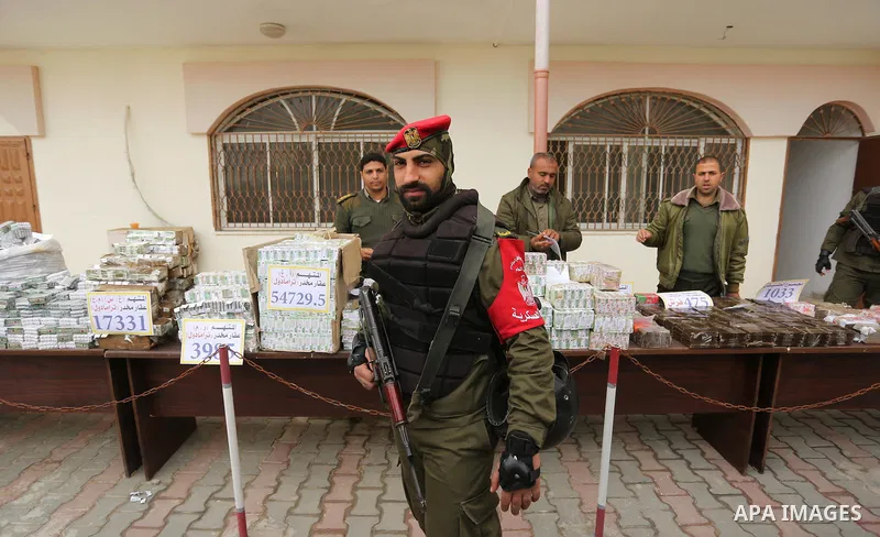 Palestinian anti-drug police participate in a conference drug damage in Gaza City on March 19, 2017. Destroying the collected drugs was part of a new campaign by Hamas-run police to combat the usage of drugs and Tramadol...