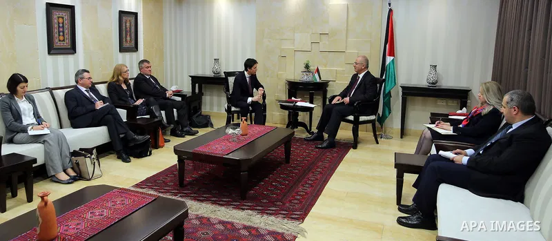 Palestinian Prime Minister Rami Hamdallah, meets with British Minister of State for International Development Rory Stewart, in West Bank, city of ramallah on March19.2017. Photo by Prime Minister Office