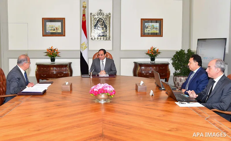 Egyptian President Abdel Fattah al-Sisi meets with Prime Minister Sharif Ismail in Cairo, Egypt, on March 19, 2017. Photo by Egyptian President Office