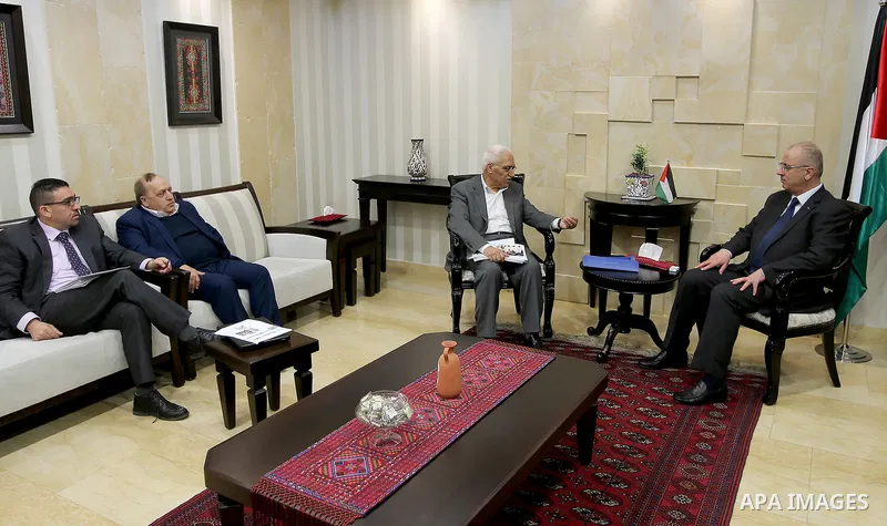 Palestinian Prime Minister Rami al-Hamdallah meets with the committee charged with investigating the events that took place before the "court complex" in Al-Bireh and in Bethlehem in the West Bank city of Ramallah on Mar...