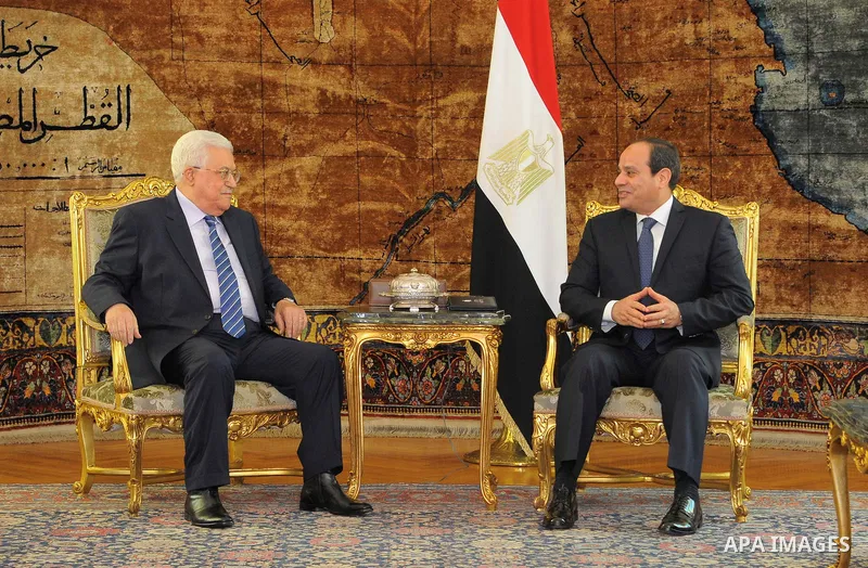 A handout picture released by the Egyptian Presidency on March 20, 2017 shows Egyptian President Abdel Fattah al-Sisi (R) meeting with Palestinian president Mahmud Abbas at the presidential palace in Cairo. Photo by Egyp...