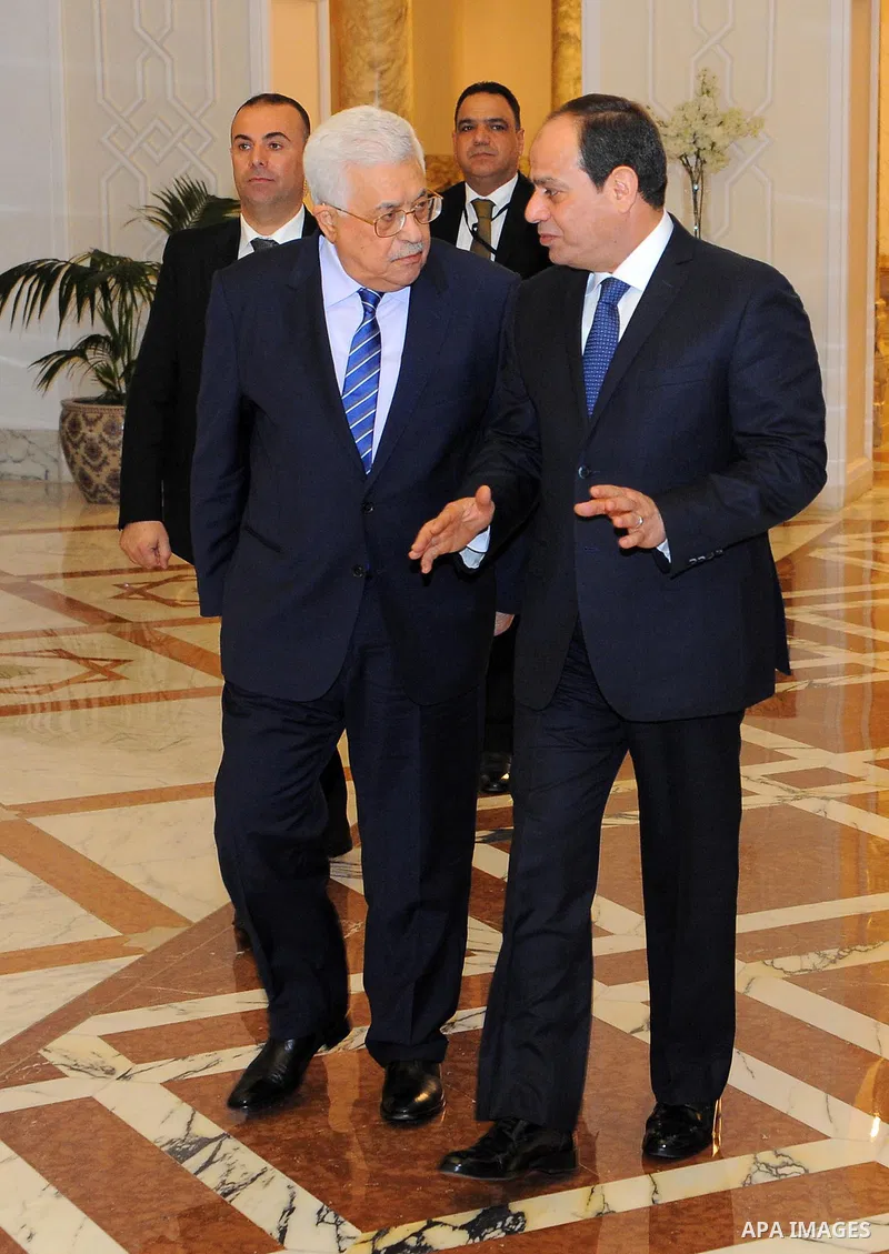 A handout picture released by the Egyptian Presidency on March 20, 2017 shows Egyptian President Abdel Fattah al-Sisi (R) meeting with Palestinian president Mahmud Abbas at the presidential palace in Cairo. Photo by Egyp...