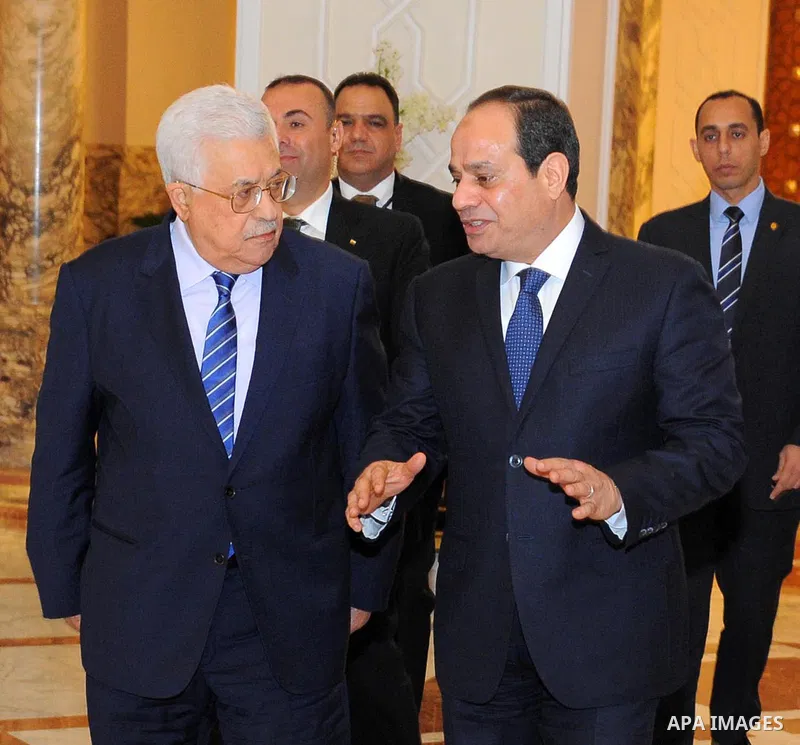 A handout picture released by the Egyptian Presidency on March 20, 2017 shows Egyptian President Abdel Fattah al-Sisi (R) meeting with Palestinian president Mahmud Abbas at the presidential palace in Cairo. Photo by Egyp...