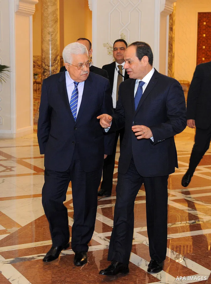 A handout picture released by the Egyptian Presidency on March 20, 2017 shows Egyptian President Abdel Fattah al-Sisi (R) meeting with Palestinian president Mahmud Abbas at the presidential palace in Cairo. Photo by Egyp...
