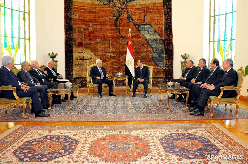A handout picture released by the Egyptian Presidency on March 20, 2017 shows Egyptian President Abdel Fattah al-Sisi (R) meeting with Palestinian president Mahmud Abbas at the presidential palace in Cairo. Photo by Egyp...