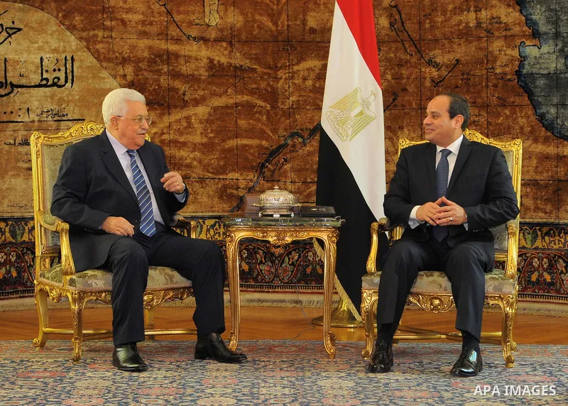 A handout picture released by the Egyptian Presidency on March 20, 2017 shows Egyptian President Abdel Fattah al-Sisi (R) meeting with Palestinian president Mahmud Abbas at the presidential palace in Cairo. Photo by Egyp...