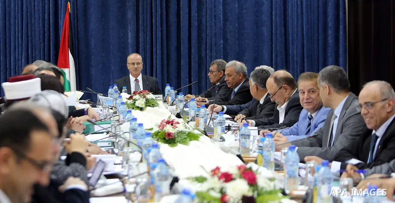 Palestinian Prime Minister Rami Hamdallah chairs a meeting of council of Ministers in the West Bank city of Jericho, on March 21, 2017. Photo by Prime Minister Office