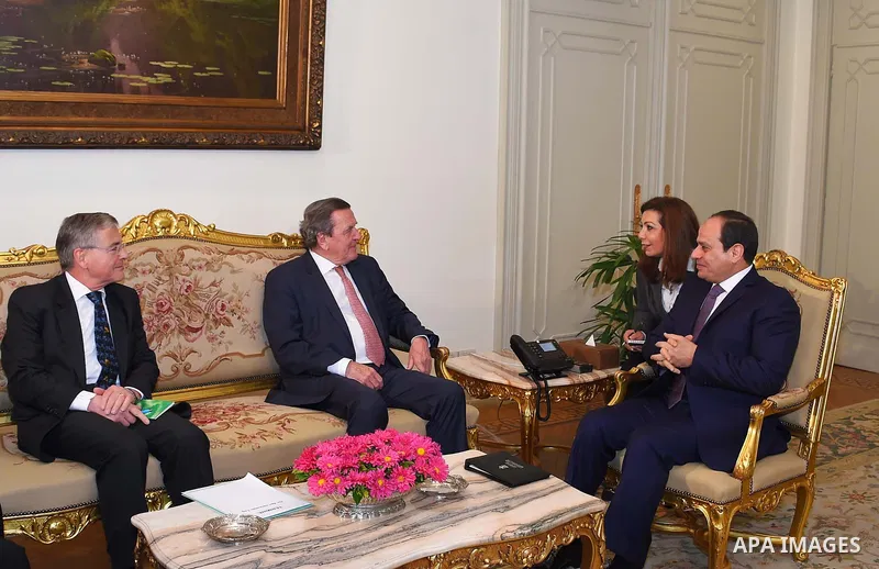 Egyptian President Abdel Fattah al-Sisi meets with Former German Chancellor Gerhard Schroeder in Cairo, Egypt, on March 21, 2017. Photo by Egyptian President Office