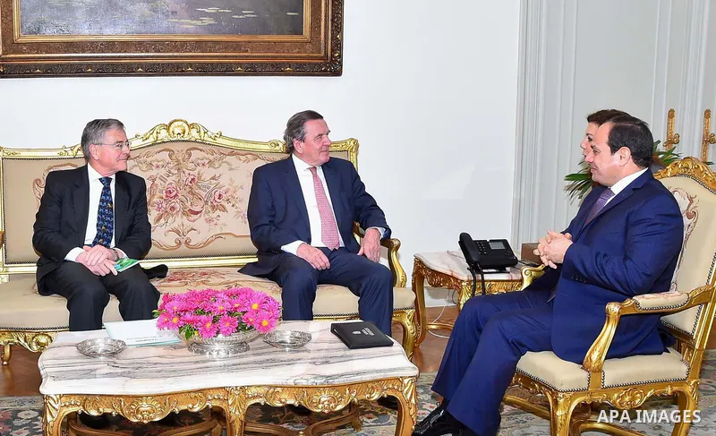 Egyptian President Abdel Fattah al-Sisi meets with Former German Chancellor Gerhard Schroeder in Cairo, Egypt, on March 21, 2017. Photo by Egyptian President Office