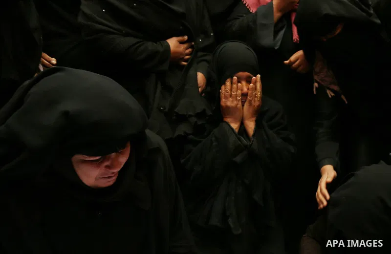 Relatives mourn around the body of Palestinian Youssef Abu Azra, who according to hospital officials was killed by Israeli fire and whom the Israeli forces said was detected with other suspects near the security fence, d...
