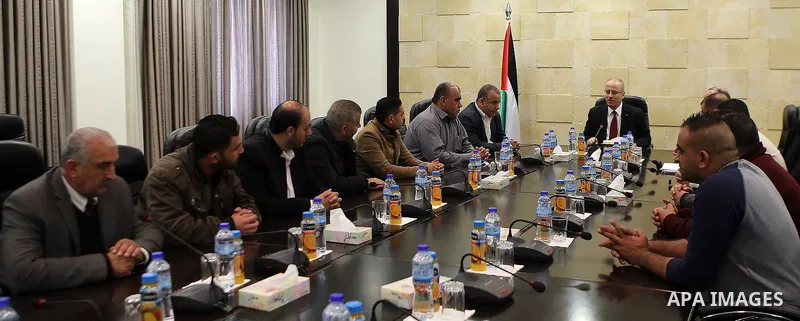 Palestinian Prime Minister Rami al-Hamdallah meets with Regulatory Authority for Qalandiya Camp , in the West Bank city of Ramallah on March 23 2017. Photo by Prime Minister Office