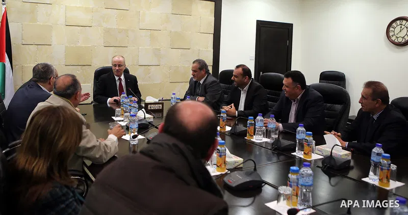 Palestinian Prime Minister Rami al-Hamdallah, meets with a delegation from the Popular Organizations, in the West Bank city of Ramallah on March 23, 2017. Photo by Prime Minister Office