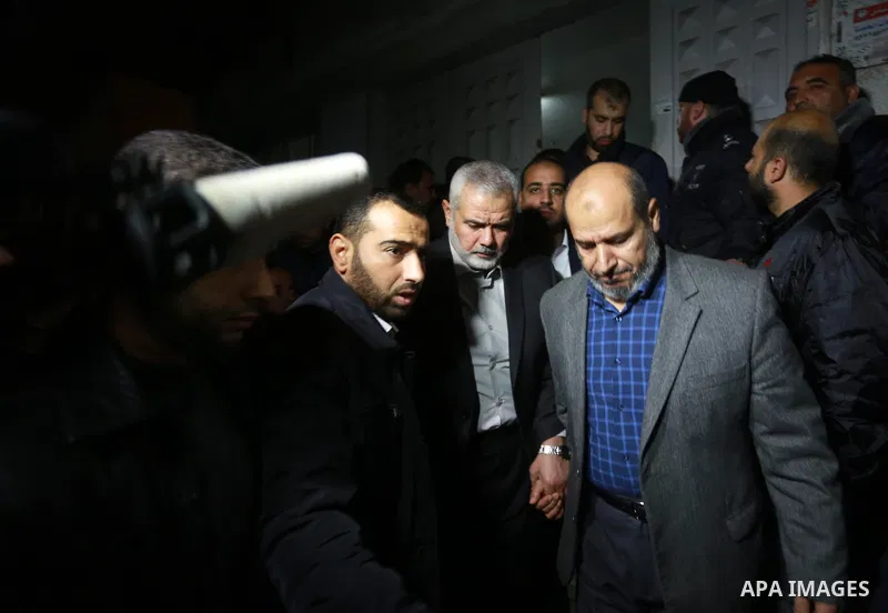 Senior Hamas leader Ismail Haniya leaves a hospital morgue in Gaza City on March 24, 2017 after gunmen in the Gaza Strip shot dead a Hamas official, Mazen Faqha, who was freed by Israel in a 2011 prisoner swap. Faqha was...