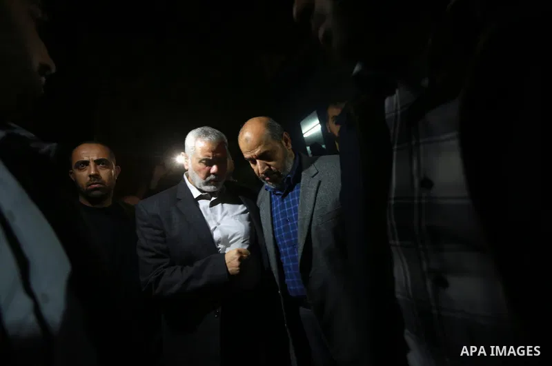 Senior Hamas leader Ismail Haniya leaves a hospital morgue in Gaza City on March 24, 2017 after gunmen in the Gaza Strip shot dead a Hamas official, Mazen Faqha, who was freed by Israel in a 2011 prisoner swap. Faqha was...