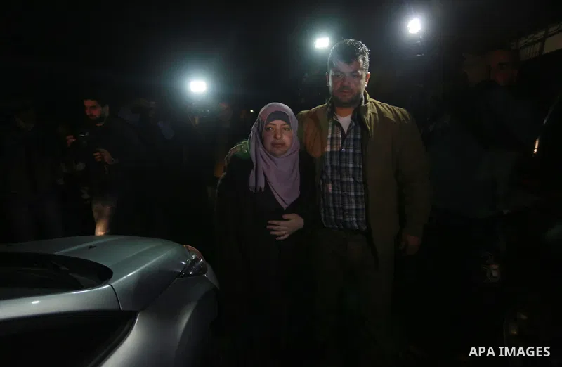 Nahid Asida, wife of Hamas official, Mazen Faqha who was shot dead by gunmen in the Gaza Strip arrives at a hospital morgue in Gaza City on March 24, 2017. Faqha was released along with more than 1,000 other Palestinians...