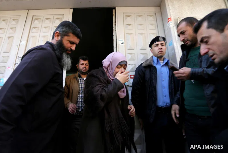 Nahid Asida, wife of Hamas official, Mazen Faqha who was freed by Israel in a 2011 prisoner swap leaves the a hospital morgue in Gaza City March 25, 2017. Faqha was released along with more than 1,000 other Palestinians...