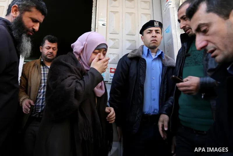Nahid Asida, wife of Hamas official, Mazen Faqha who was freed by Israel in a 2011 prisoner swap leaves the a hospital morgue in Gaza City March 25, 2017. Faqha was released along with more than 1,000 other Palestinians...