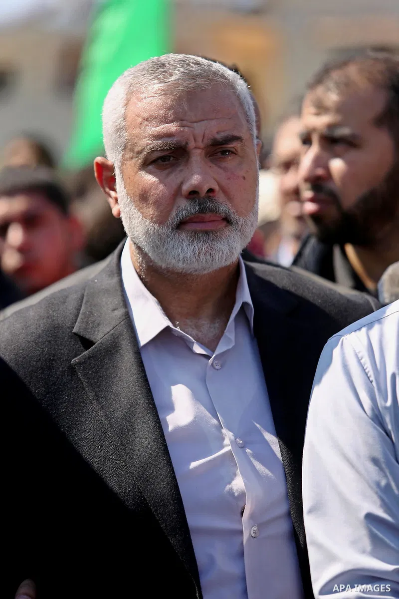 Senior political leaders of the Islamist movement, Ismail Haniyeh attends the funeral of Hamas official, Mazen Faqha in Gaza city on March 25, 2017. Gunmen in the Gaza Strip had shot dead the Hamas official on March 24,...