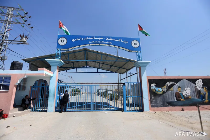 Palestinians wait at Erez border crossing into Israel, in Beit Hanun, in the northern Gaza Strip on March 26, 2017, after it was shut by the Islamist movement after blaming the Jewish state for the assassination of one o...