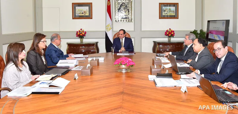 Egyptian President Abdel Fattah al-Sisi, meets with Prime Minister Sharif Ismail, in Cairo, Egypt, on March 26, 2017. Photo by Egyptian President Office