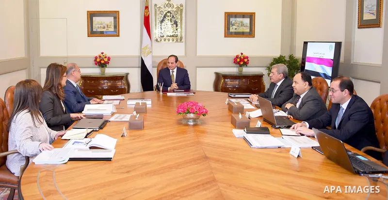 Egyptian President Abdel Fattah al-Sisi, meets with Prime Minister Sharif Ismail, in Cairo, Egypt, on March 26, 2017. Photo by Egyptian President Office
