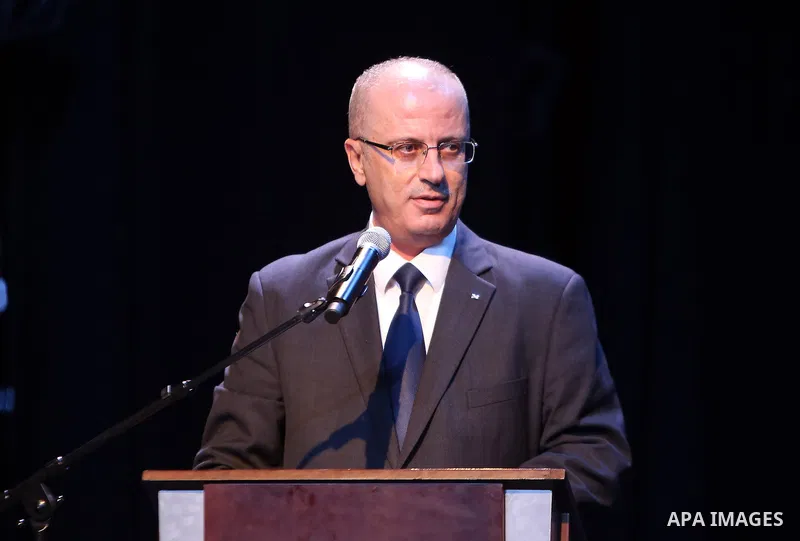 Palestinian Prime Minister Rami Hamdallah speaks during the opening ceremony of the Municipal Theater in Ramallah city Municipality, in the West Bank city of Ramallah, on March 27, 2017. Photo by Prime Minister Office