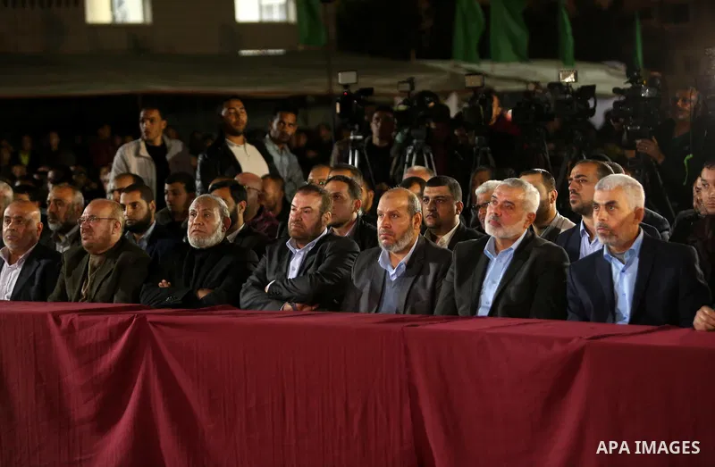 Yahya Sinwar, the new leader of Hamas in the Gaza Strip and senior political leaders of the Islamist movement, Ismail Haniyeh attend a memorial service of Hamas official, Mazen Faqha, who was shot dead by unknown gunmen,...