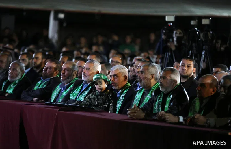 Yahya Sinwar, the new leader of Hamas in the Gaza Strip and senior political leaders of the Islamist movement, Ismail Haniyeh attend a memorial service of Hamas official, Mazen Faqha, who was shot dead by unknown gunmen,...