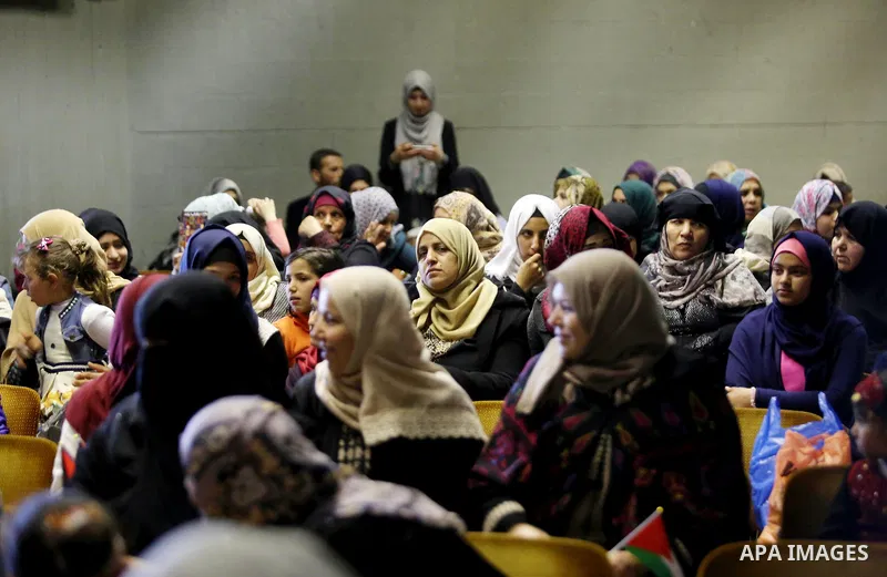 Palestinians attend a festival titled "our land..our identity" marking the Land day in Gaza city on March 29, 2017. Photo by Ashraf Amra