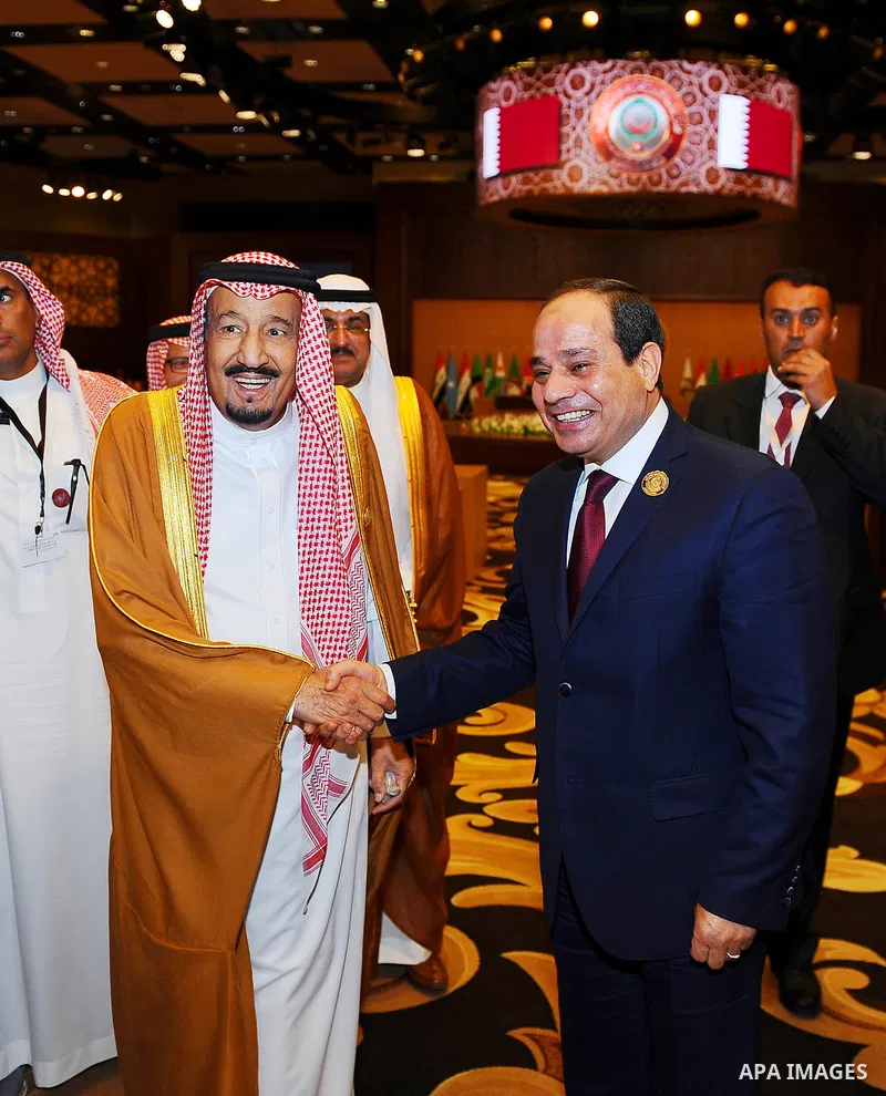 Egypt's President Abdel Fattah al-Sisi shakes hands with Saudi Arabia's King Salman bin Abdulaziz al-Saud, on the sideline of the 28th Summit of the Arab League at the Dead Sea, Jordan March 29, 2017. Photo by Egyptian P...