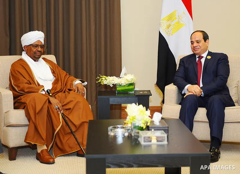 Egypt's President Abdel Fattah al-Sisi meets with Sudanese President Omar al-Bashir, on the sideline of the 28th Summit of the Arab League at the Dead Sea, Jordan March 29, 2017. Photo by Egyptian President Office
