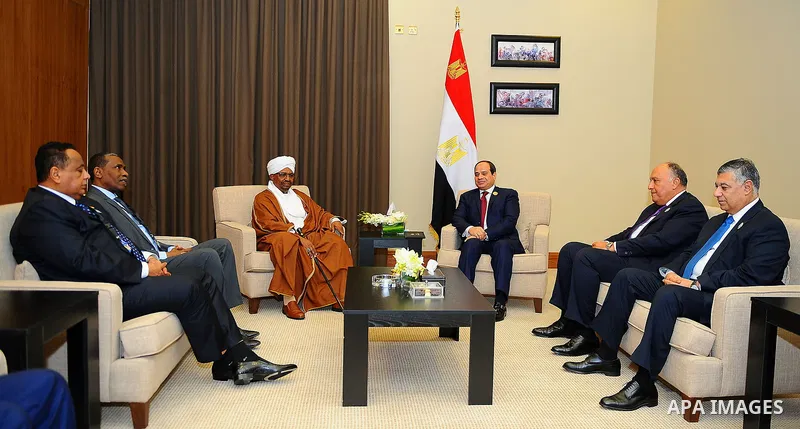 Egypt's President Abdel Fattah al-Sisi meets with Sudanese President Omar al-Bashir, on the sideline of the 28th Summit of the Arab League at the Dead Sea, Jordan March 29, 2017. Photo by Egyptian President Office
