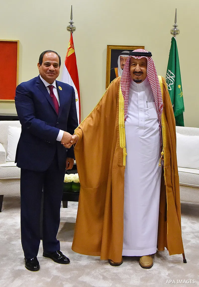 Egypt's President Abdel Fattah al-Sisi shakes hands with Saudi Arabia's King Salman bin Abdulaziz al-Saud, on the sideline of the 28th Summit of the Arab League at the Dead Sea, Jordan March 29, 2017. Photo by Egyptian P...